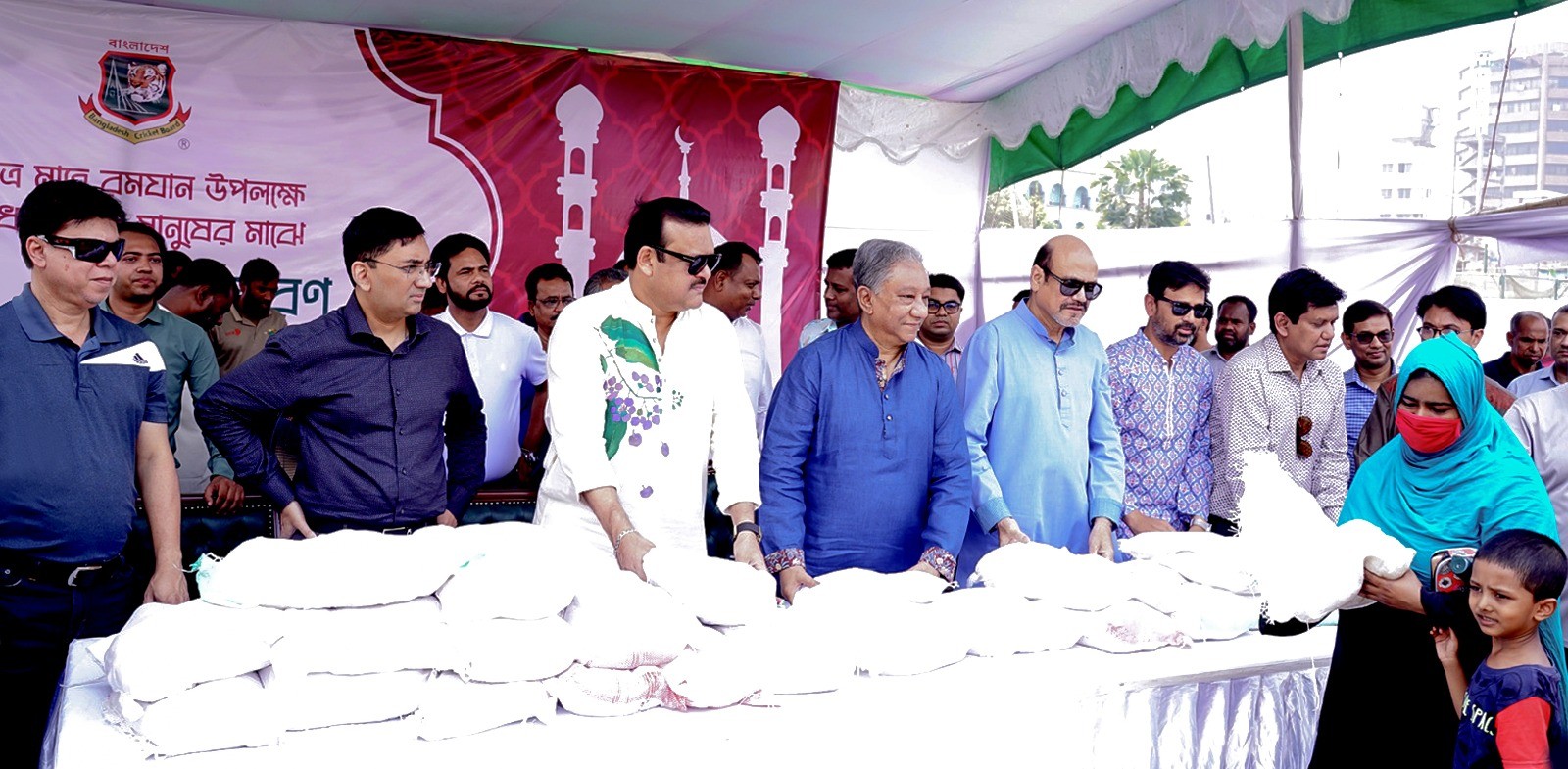 Bangladesh Cricket Board (BCB) distributed food and grocery packs to the less fortunate people